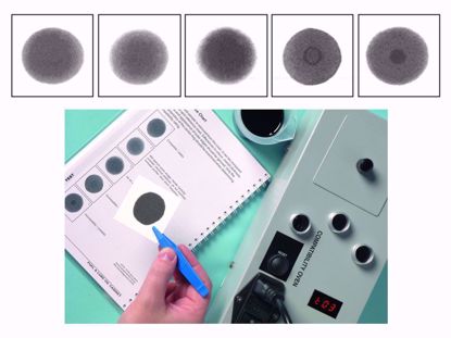 Pack of chromatography papers used in testing for insolubles and compatibility.